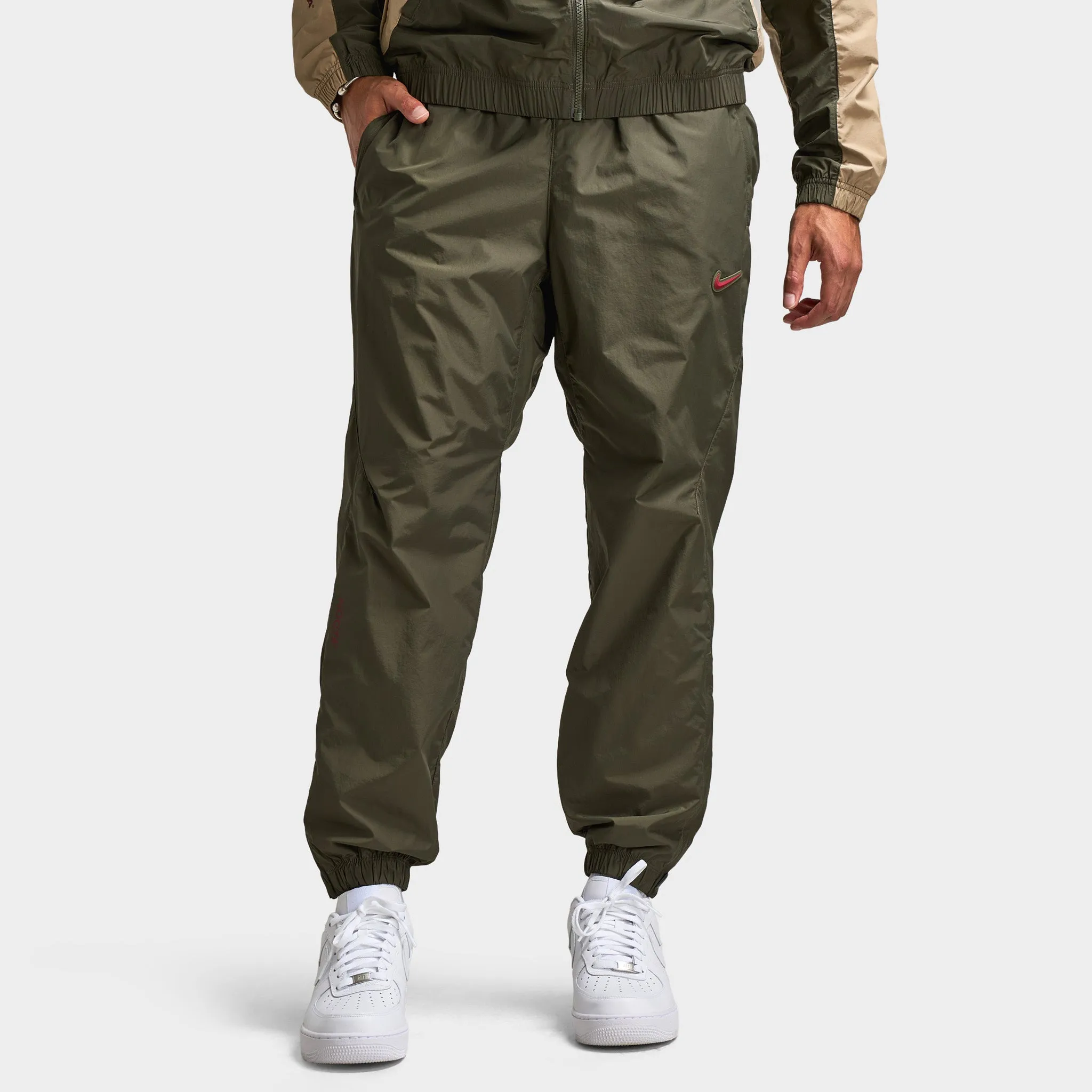 Nike NOCTA CS Cardinal Woven Track Pants Cargo Khaki / Smoke Grey sold by JD Sports