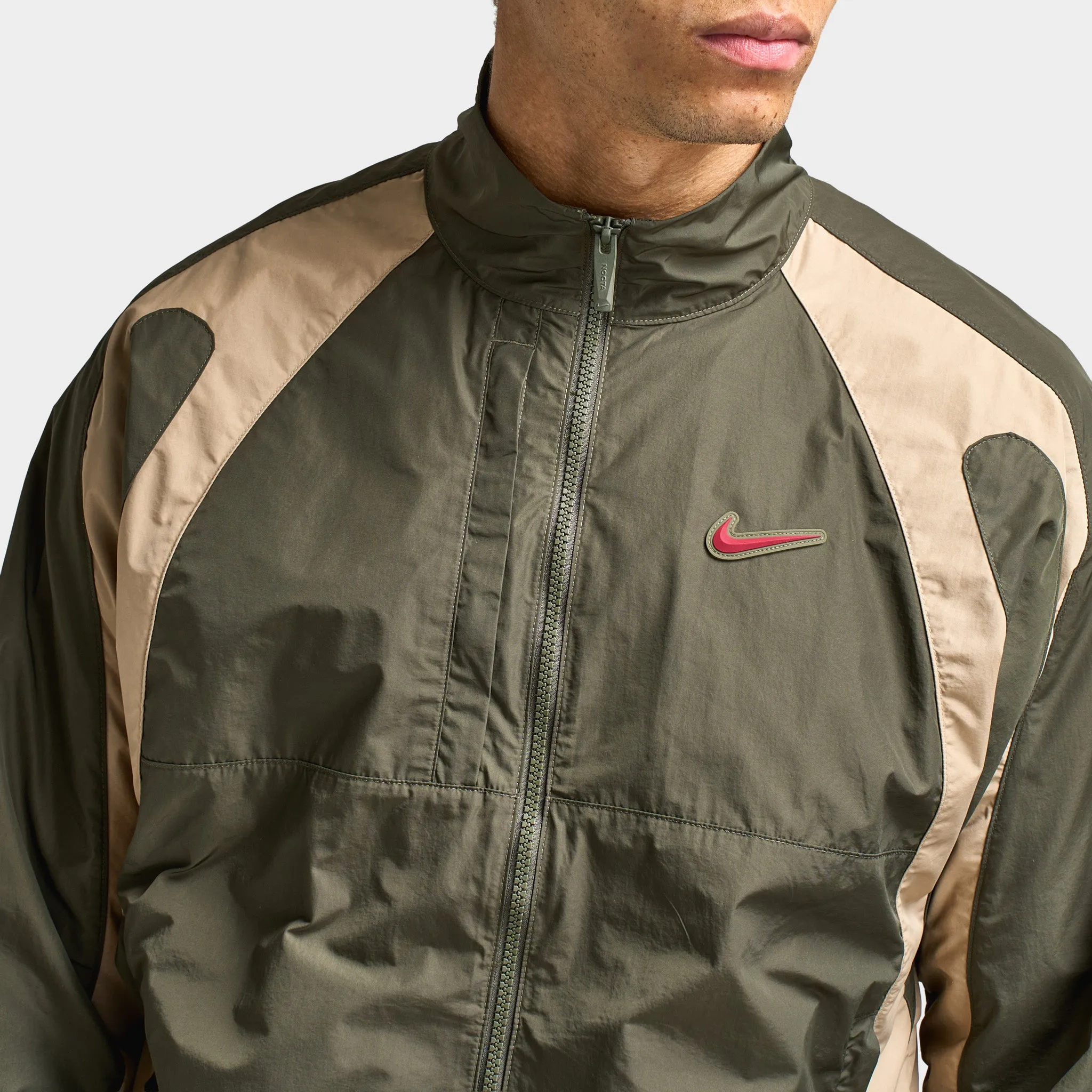 Nike NOCTA CS Cardinal Woven Track Jacket Cargo Khaki / Smoke Grey sold by JD Sports product image thumbnail 3