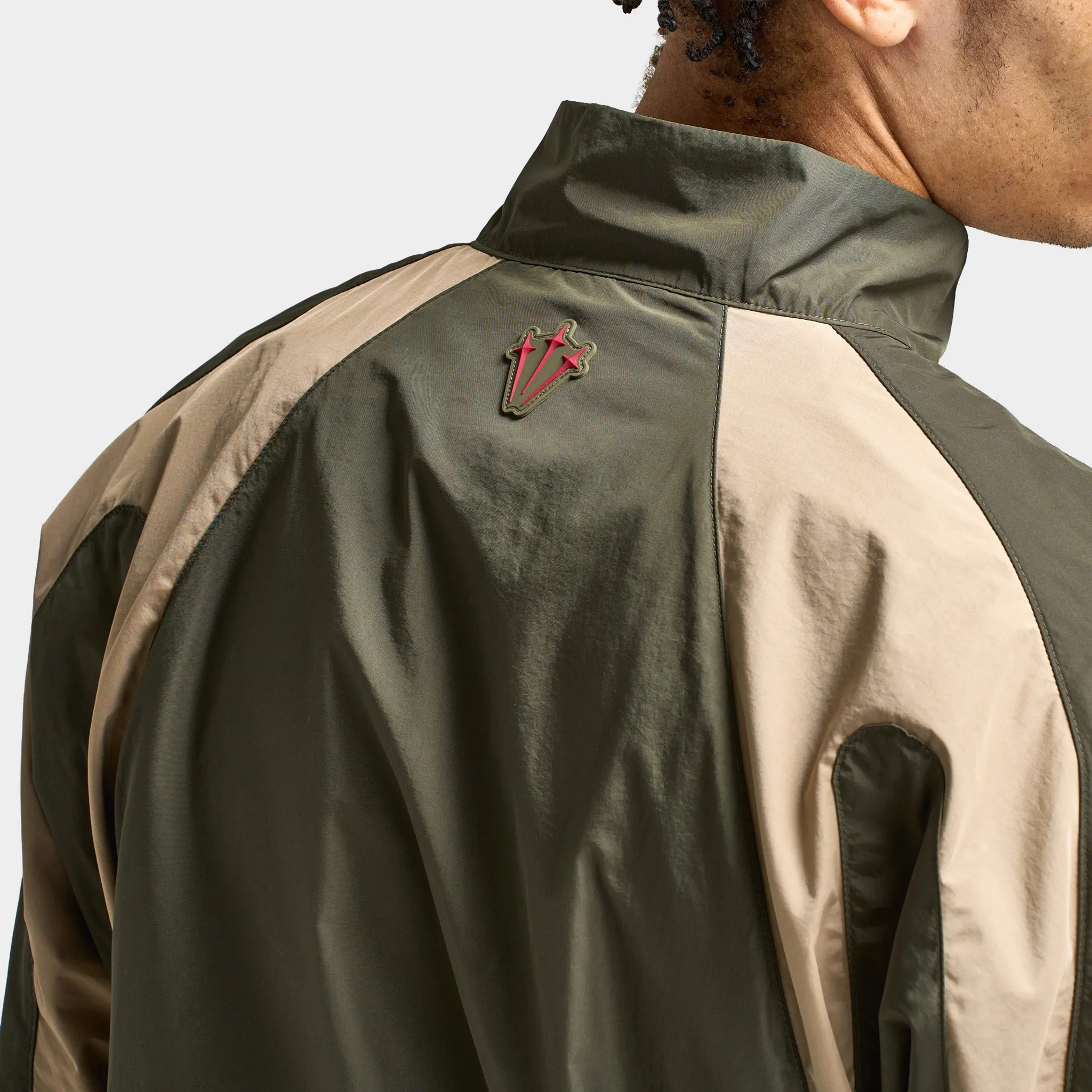 Nike NOCTA CS Cardinal Woven Track Jacket Cargo Khaki / Smoke Grey sold by JD Sports product image thumbnail 4