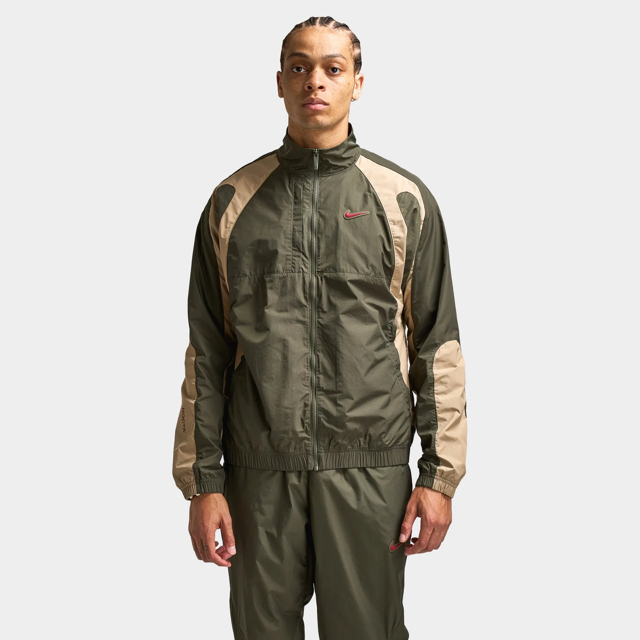 Nike NOCTA CS Cardinal Woven Track Jacket Cargo Khaki / Smoke Grey sold by JD Sports