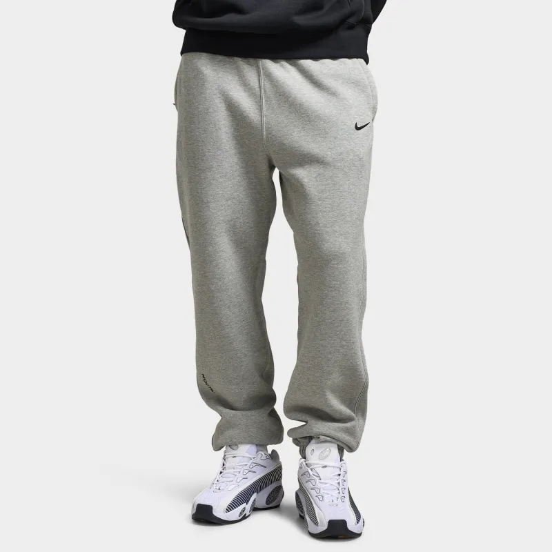 Nike NOCTA Cardinal Fleece Sweatpants Dark Heather Grey / Black sold by JD Sports