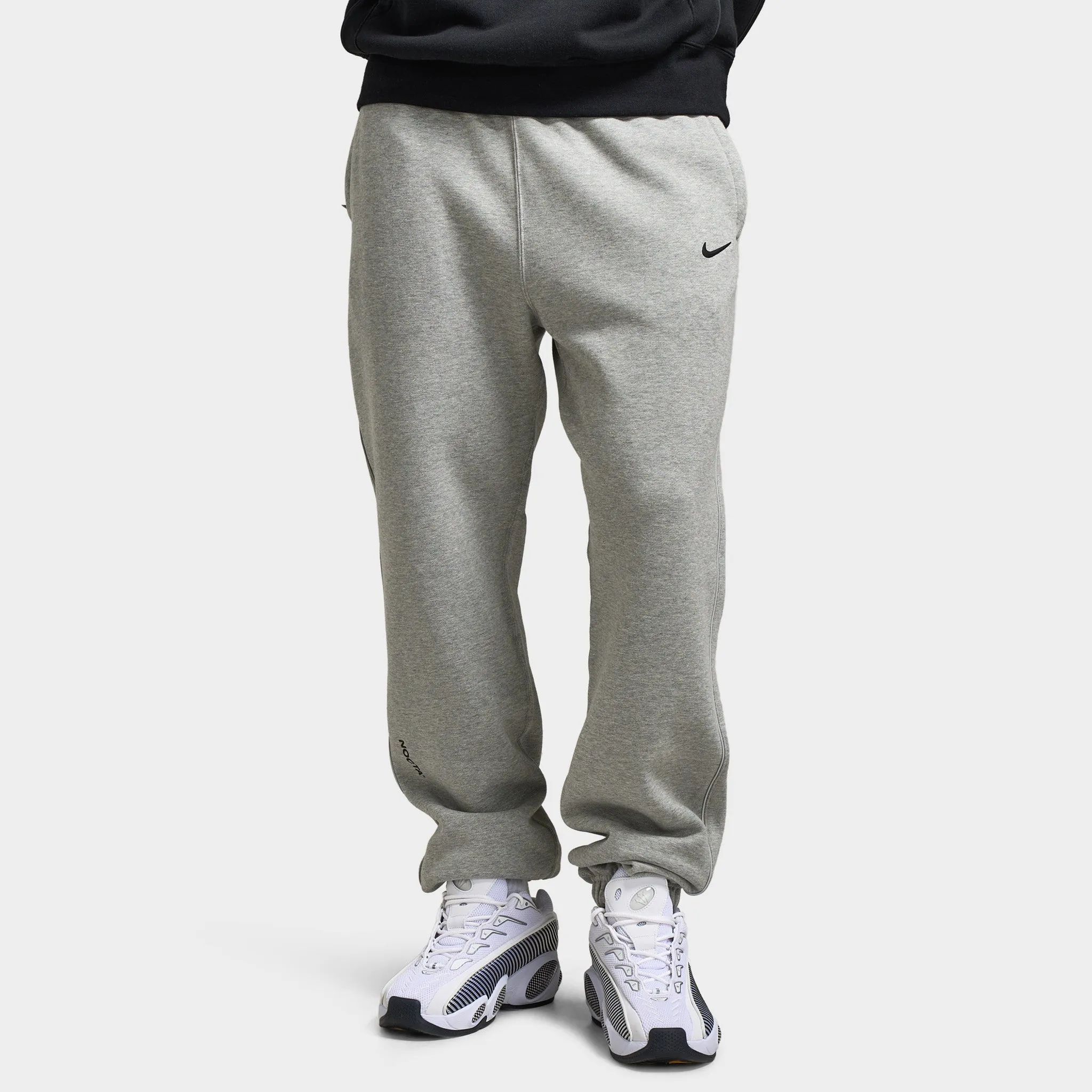 Nike NOCTA Cardinal Fleece Sweatpants Dark Heather Grey / Black sold by JD Sports