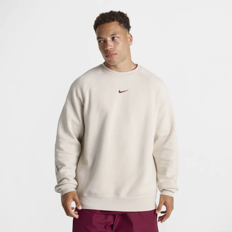 Nike NOCTA CS Cardinal Fleece Crewneck Light Orewood Brown / Team Red sold by JD Sports