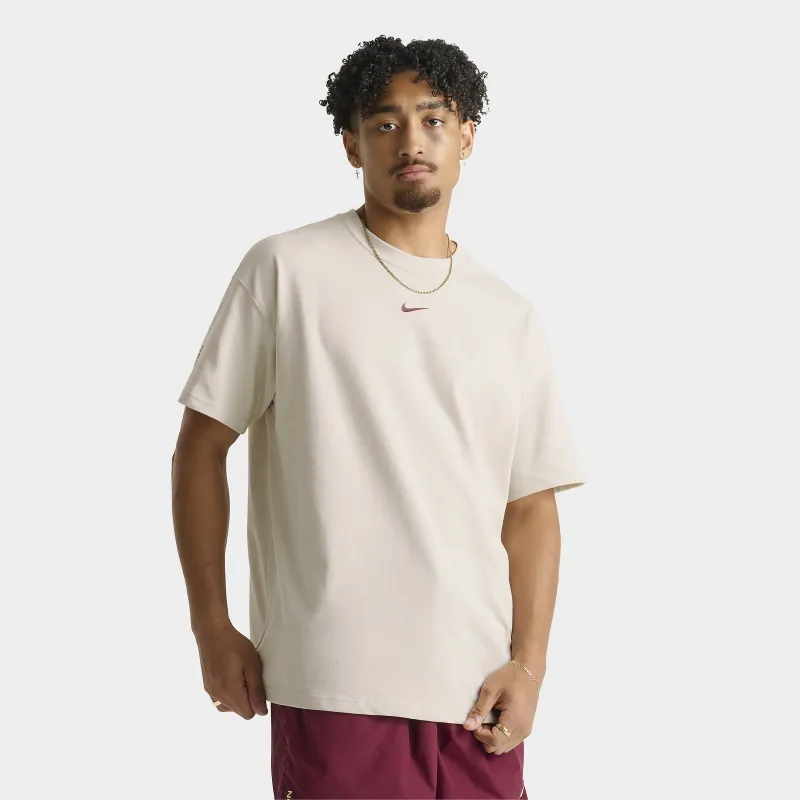 Nike NOCTA Cardinal CS Cardinal T-Shirt Light Orewood Brown / Team Red sold by JD Sports