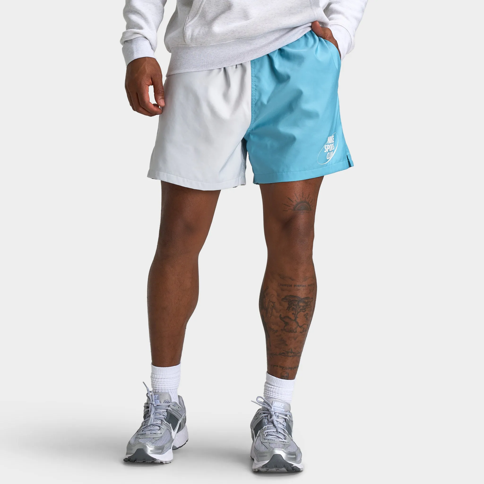 Nike Club 5" Flow Shorts Photon Dust / Denim Turq sold by JD Sports