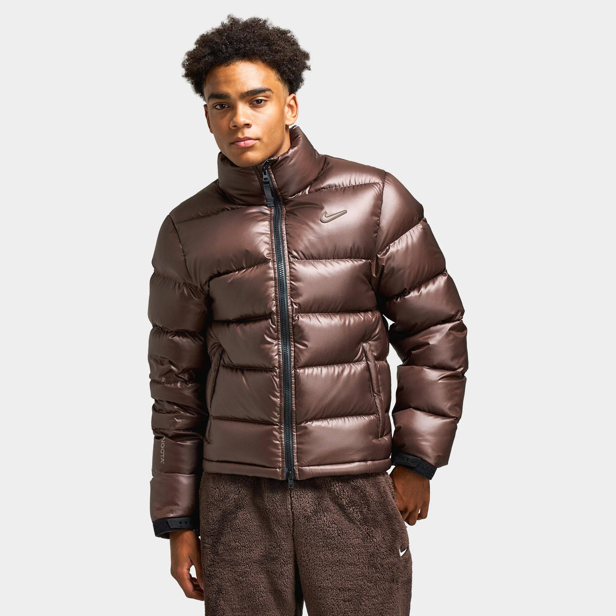 Nike NOCTA Sunset Puffer Baroque Brown/Olive Grey sold by JD Sports