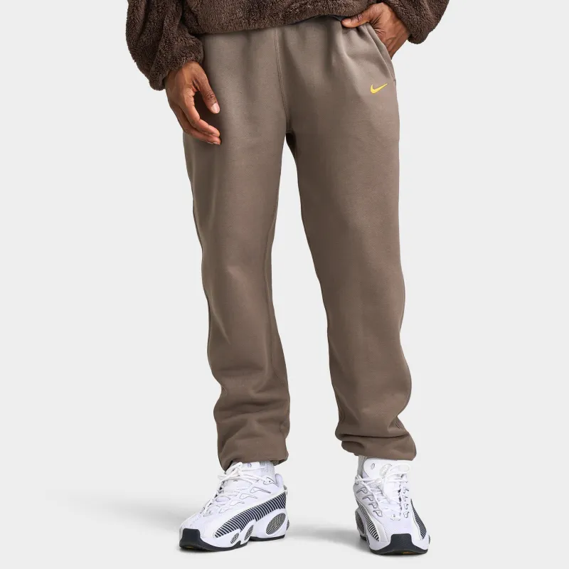 Nike NOCTA Fleece CS Pants Olive Grey / Yellow Ochre sold by JD Sports