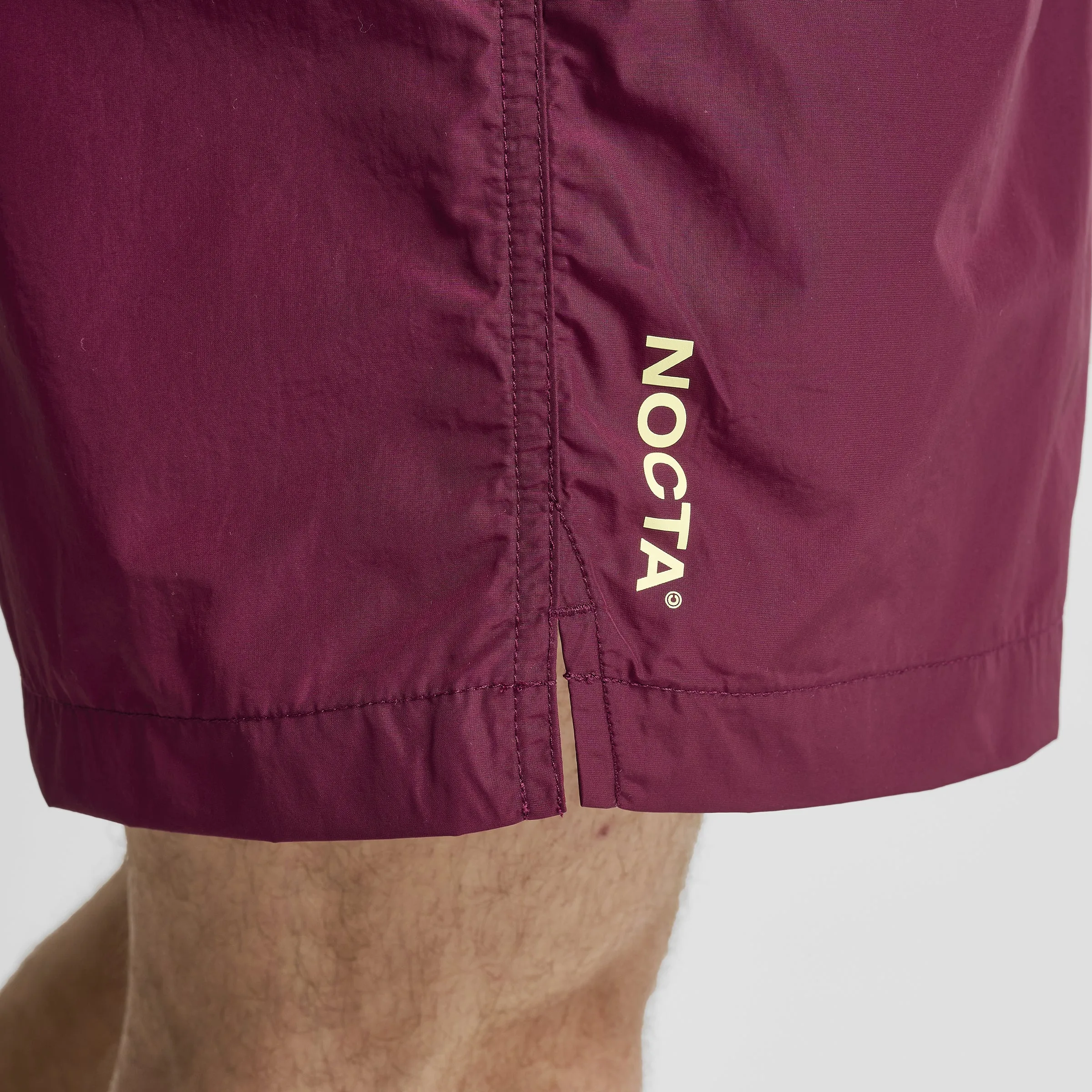Nike NOCTA Cardinal Nylon Shorts Dark Beetroot / Adobe - Citron Tint sold by JD Sports product image thumbnail 4