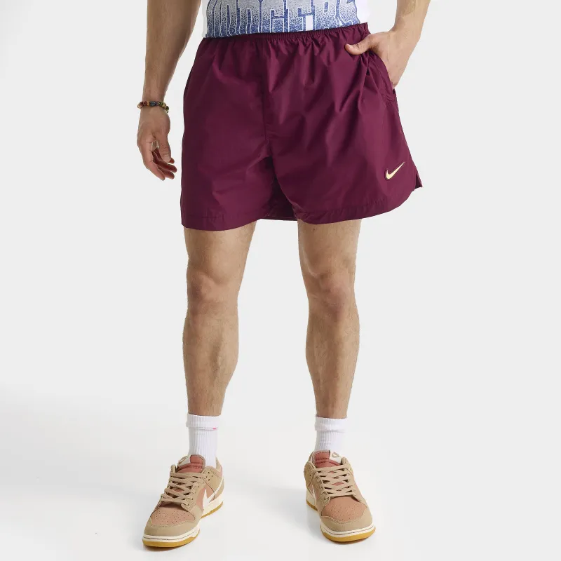 Nike NOCTA Cardinal Nylon Shorts Dark Beetroot / Adobe - Citron Tint sold by JD Sports