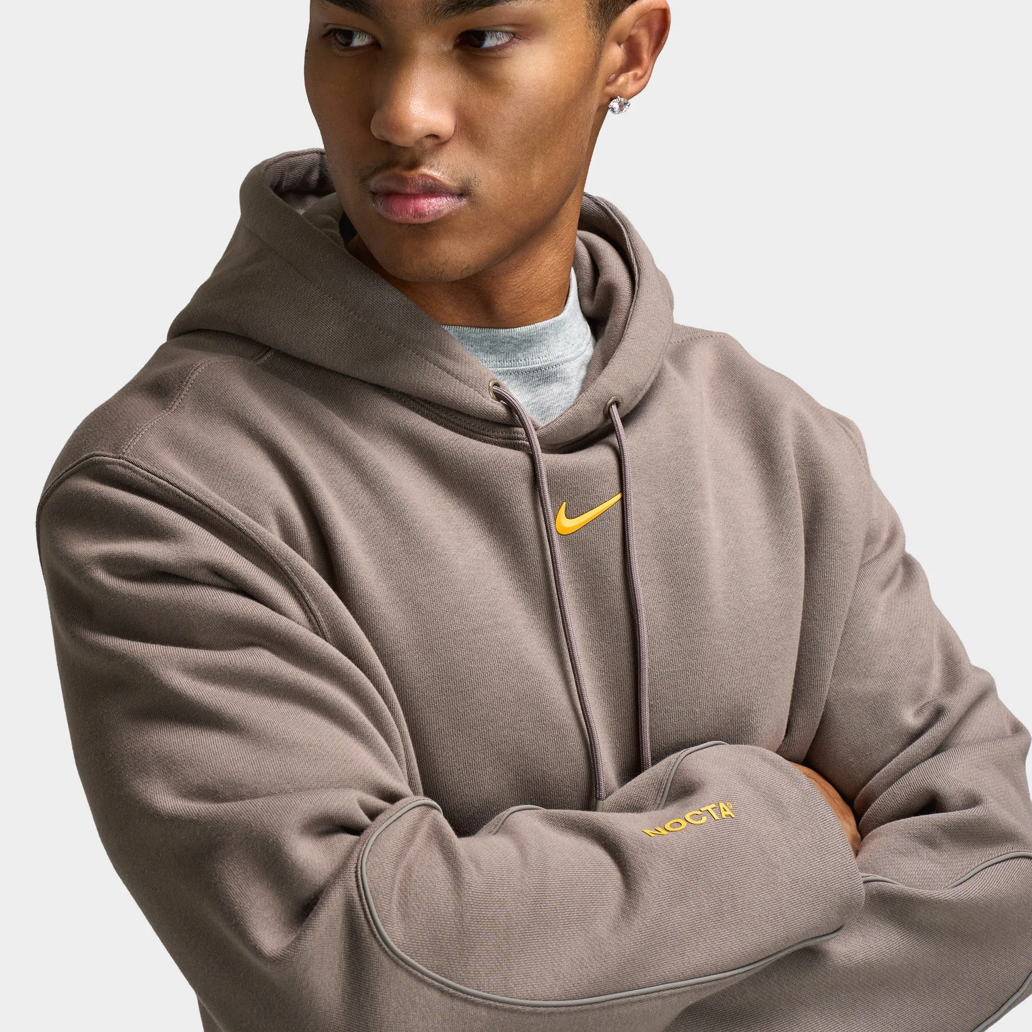 Nike Nocta Hoodie Fleece Olive Grey / Yellow Ochre sold by JD Sports product image thumbnail 3