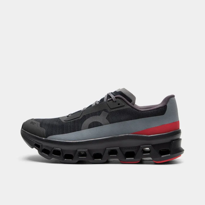 On Cloudmonster Void Black / Red sold by JD Sports