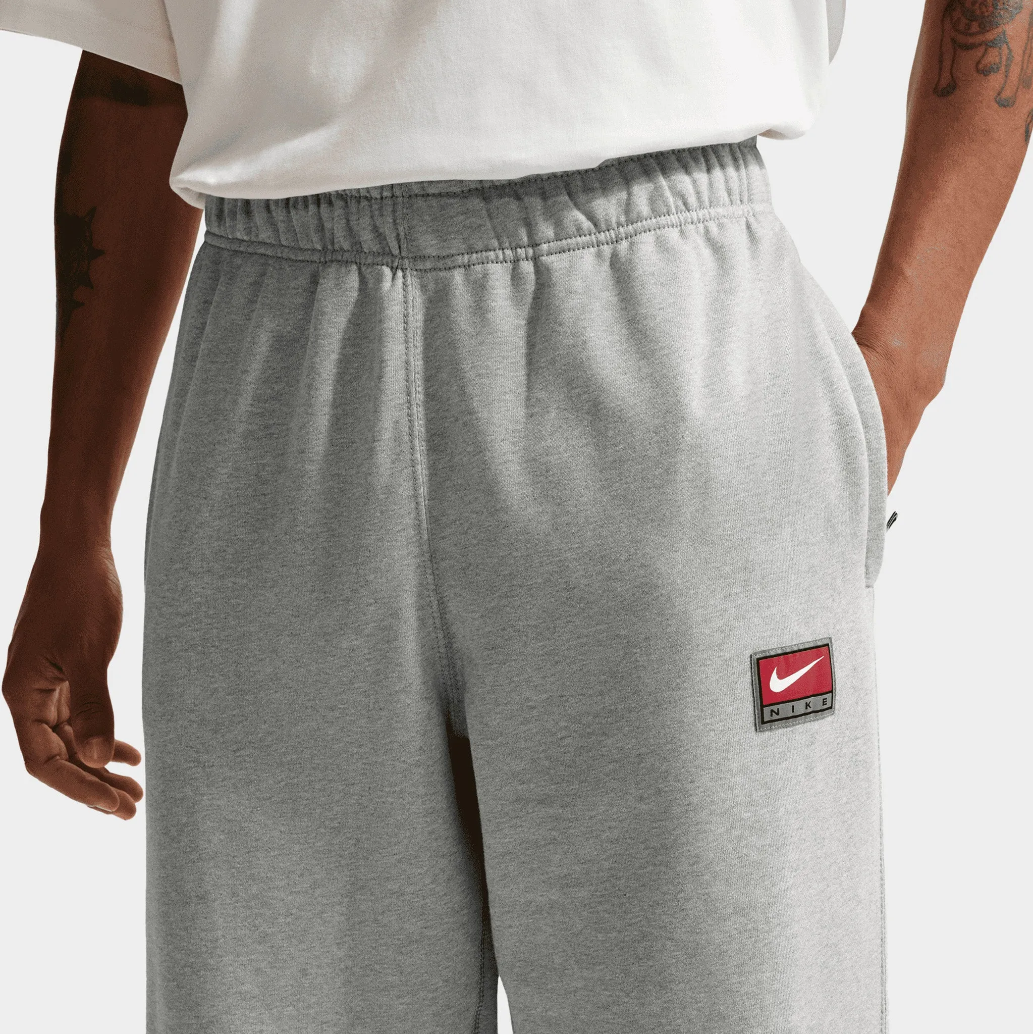 Nike Solo Swoosh Open Hem Fleece Pants / Grey Heather sold by JD Sports