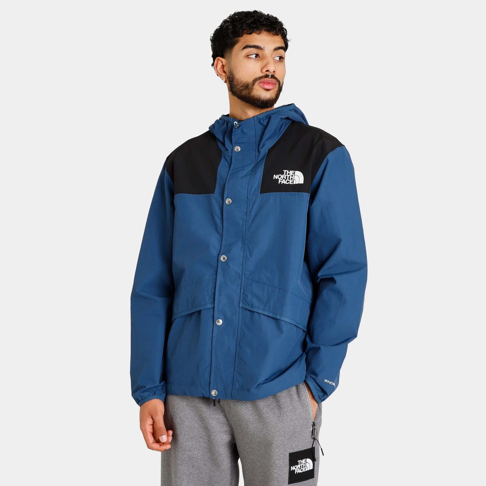 The North Face 86 Mountain Wind Jacket Shady Blue / Black sold by JD Sports