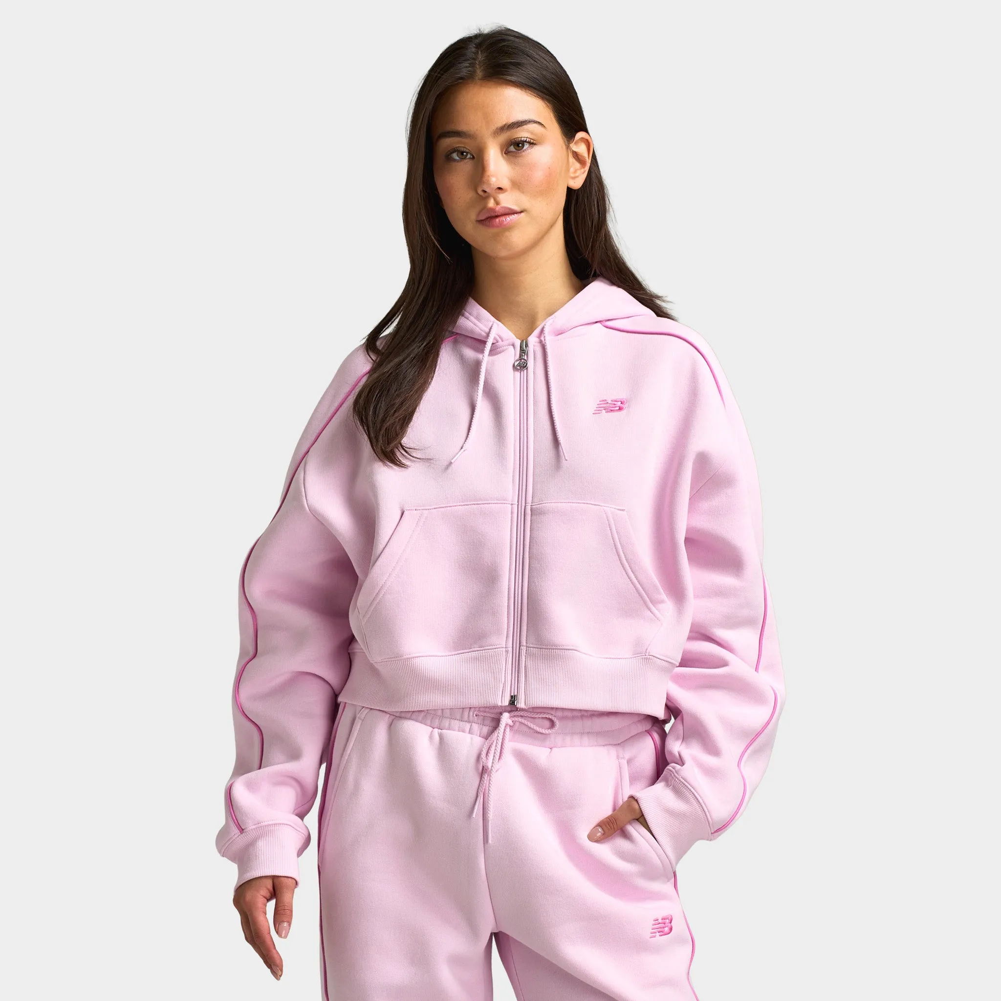 New Balance Women's Piping Full-Zip Hoodie / Light Raspberry sold by JD Sports