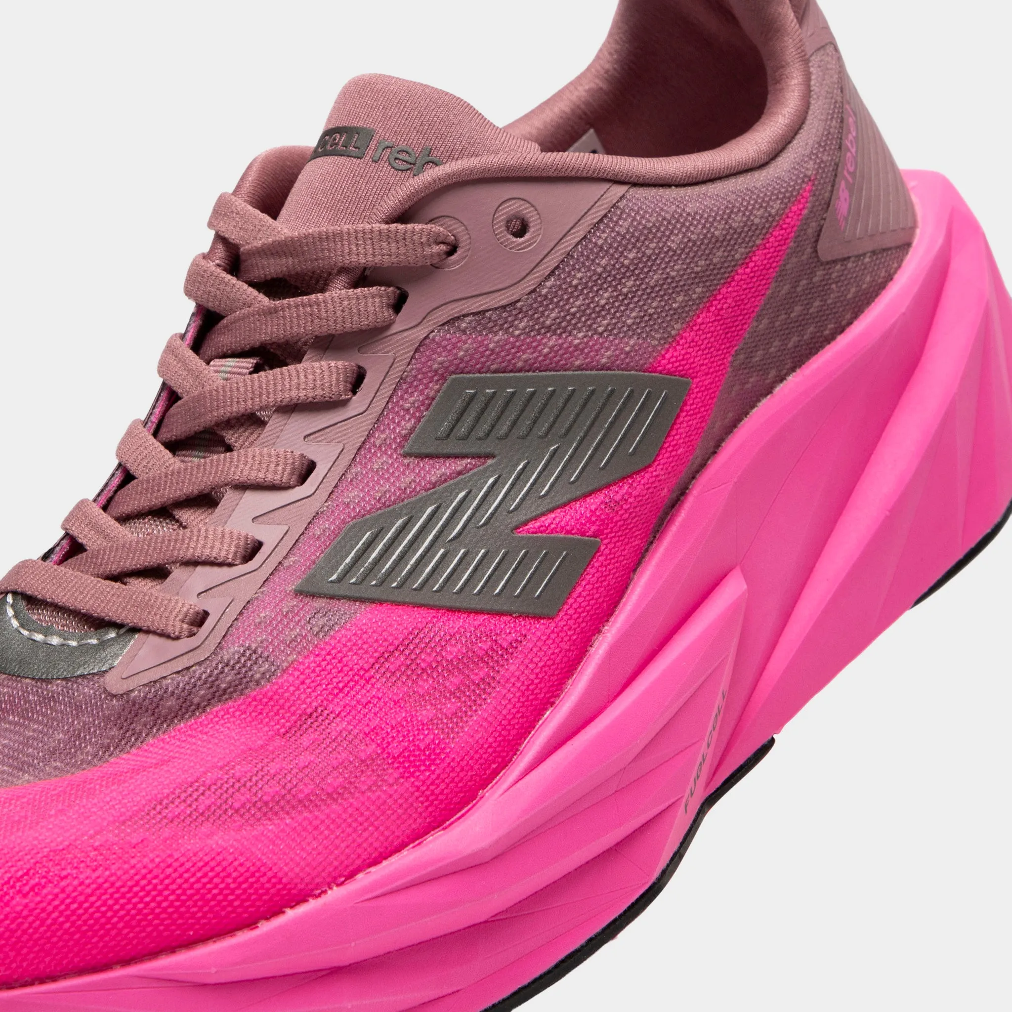 New Balance Women's Fuelcell Rebel v5 Pink Heat / Rosewood sold by JD Sports product image thumbnail 3
