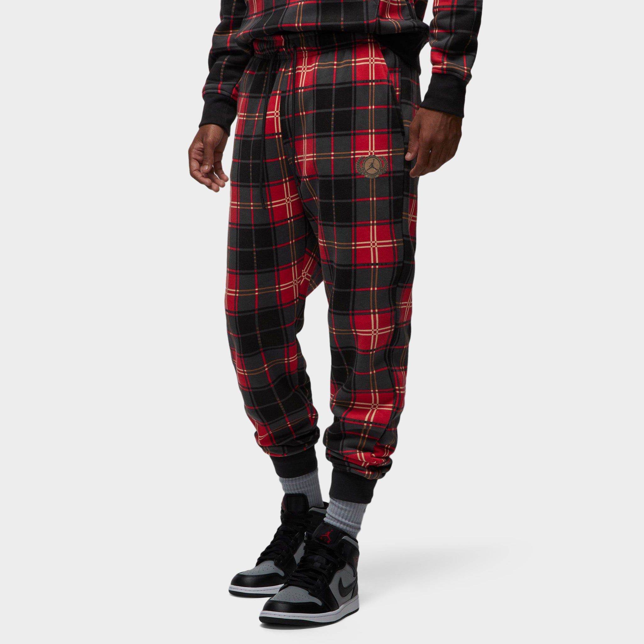 Jordan Essentials Holiday Plaid Fleece Pants Fire Red / Dark Driftwood sold by JD Sports
