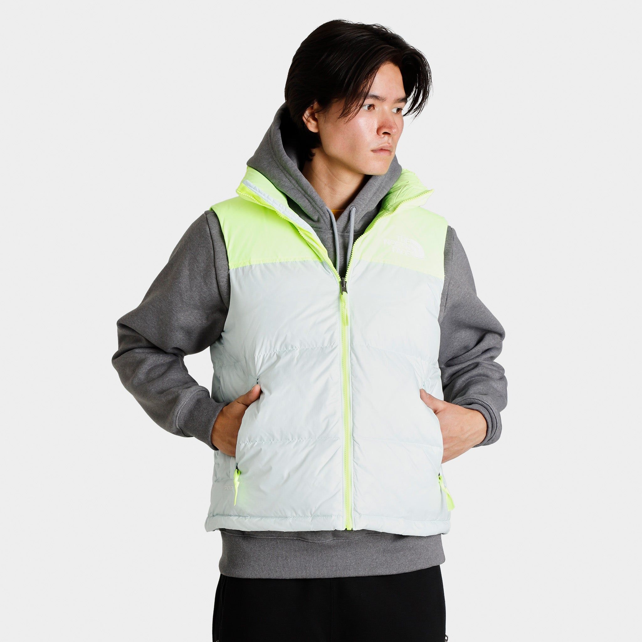 The North Face 1996 Retro Nuptse Vest Skylight Blue / LED Yellow sold by JD Sports