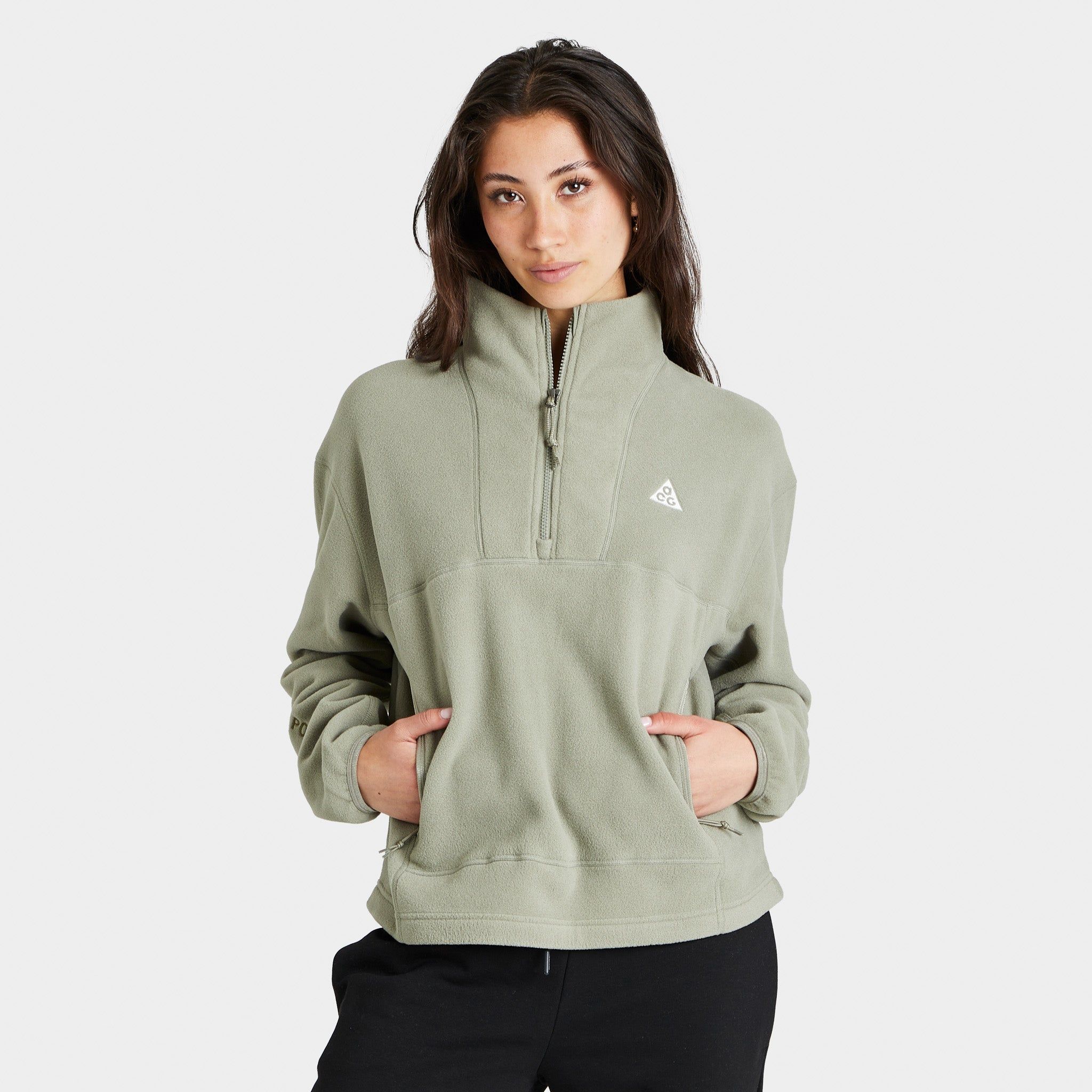 Nike ACG Women’s Therma-FIT Wolf Tree Half-Zip Crewneck Light Army / Medium Olive - Summit White sold by JD Sports
