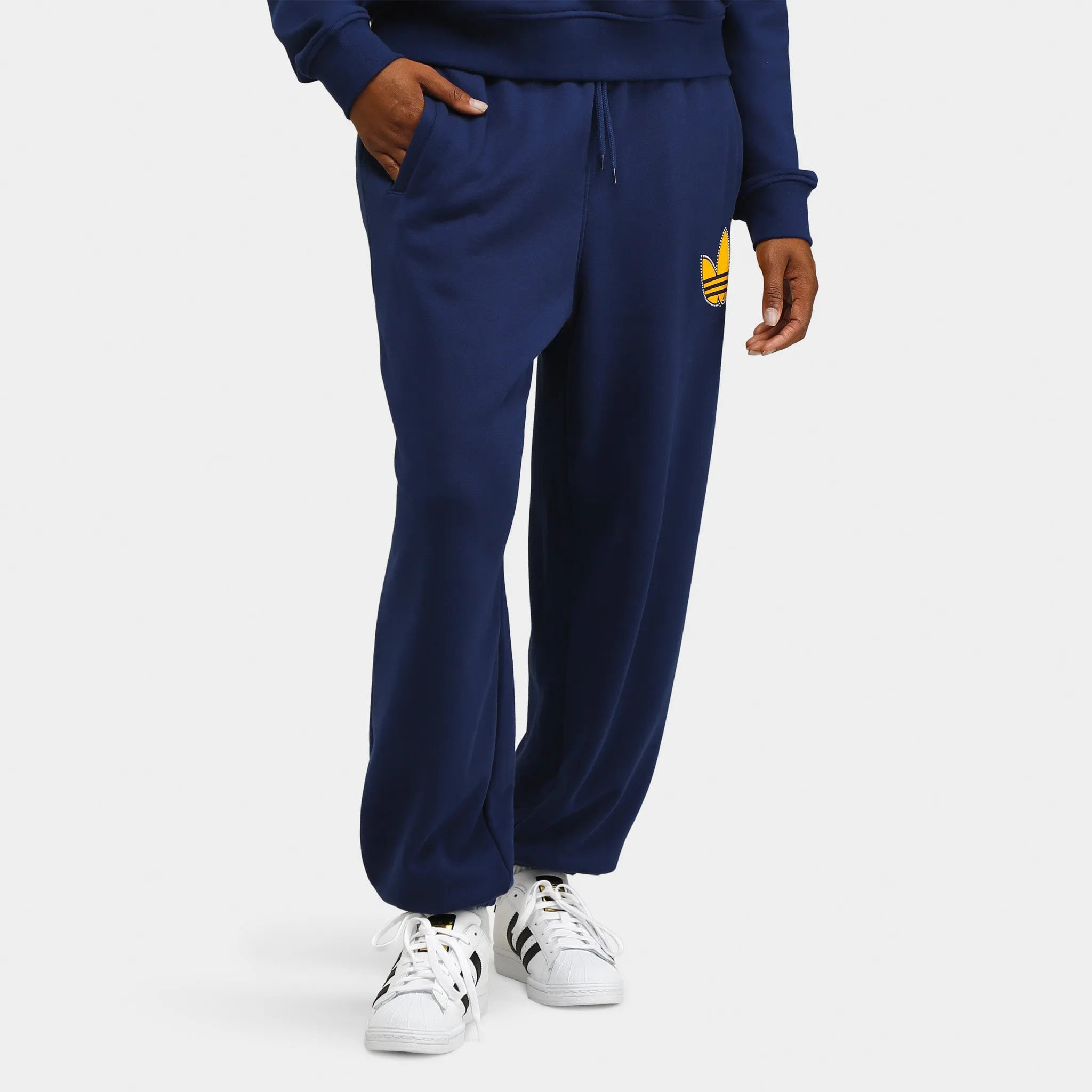 adidas Women's Pearl Trefoil Cuffed Sweatpants / Dark Blue sold by JD Sports