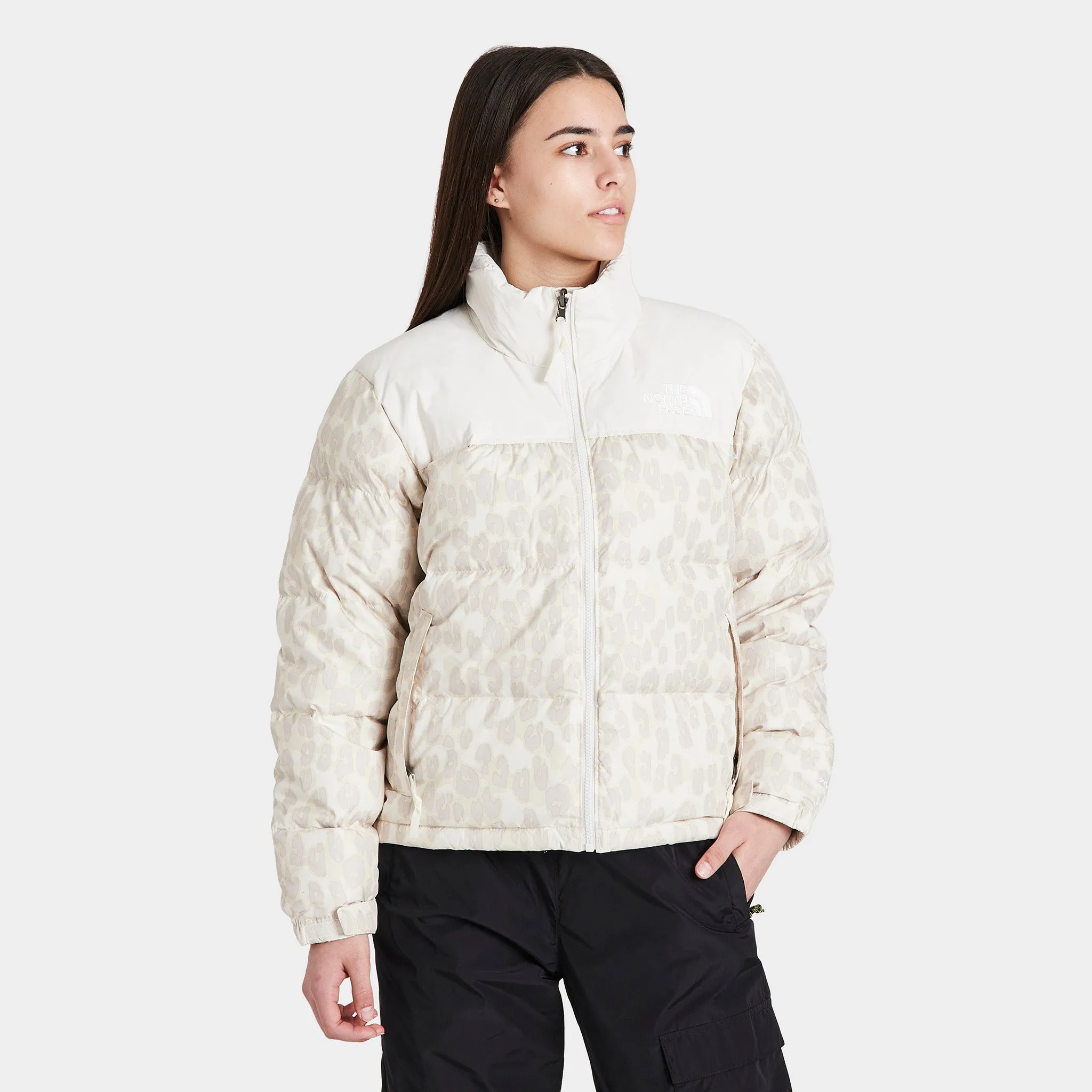 The North Face Women's Printed 1996 Retro Nuptse Jacket Silver Grey Leopard Print / Gardenia White sold by JD Sports