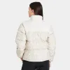 The North Face Women's Printed 1996 Retro Nuptse Jacket Silver Grey Leopard Print / Gardenia White sold by JD Sports