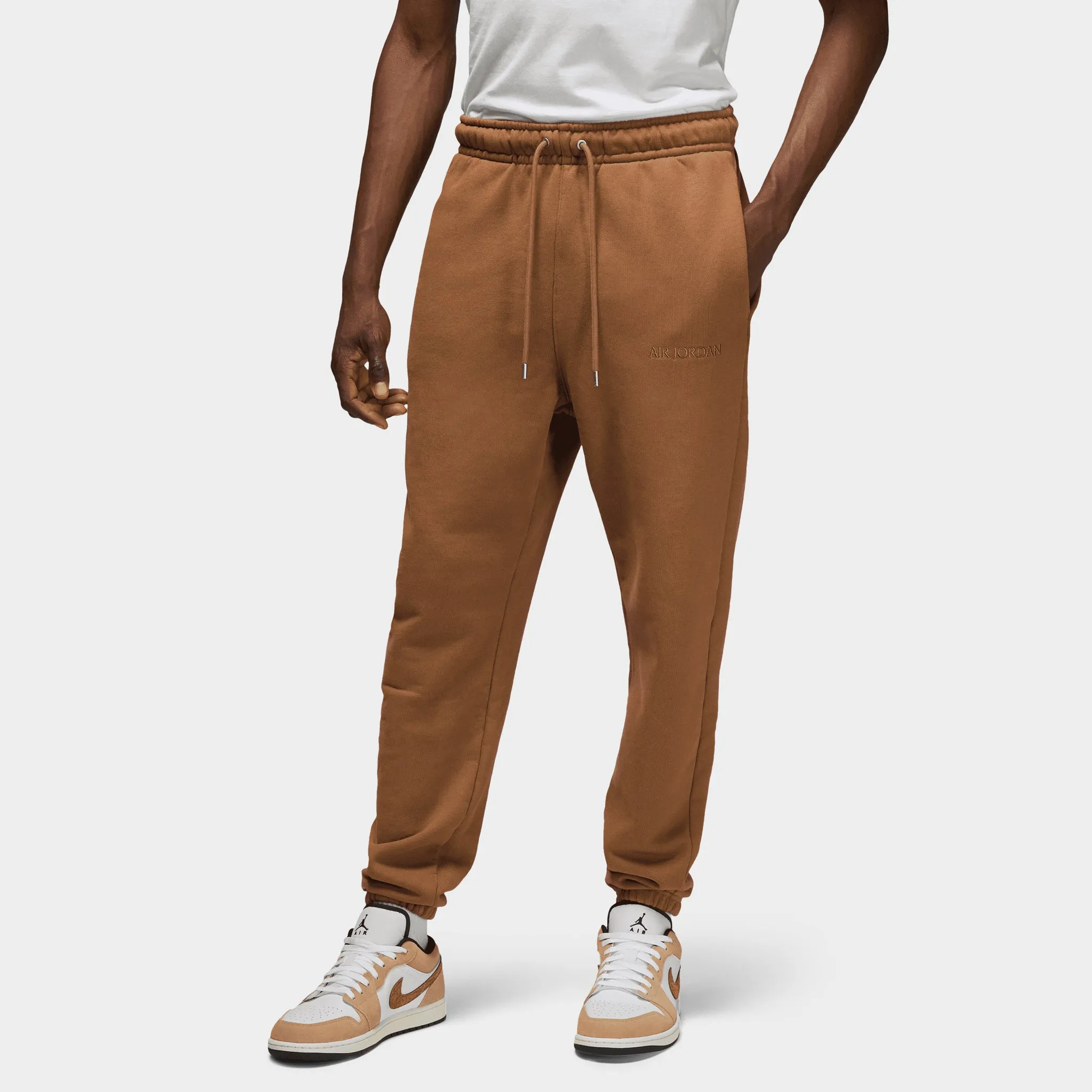 Jordan Wordmark Fleece Pants / Light British Tan sold by JD Sports
