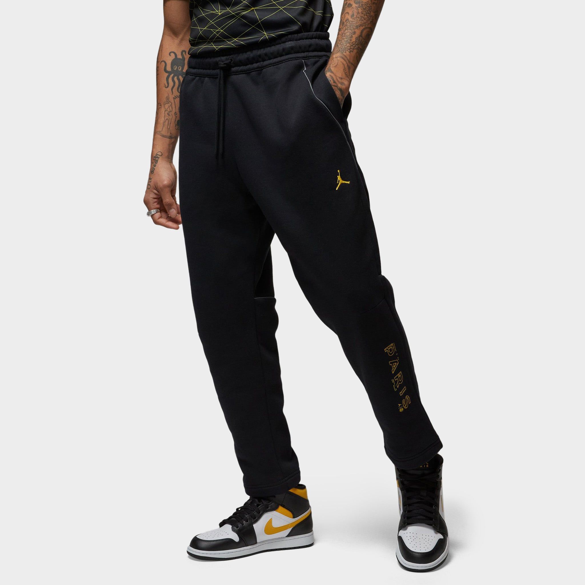 Jordan Paris Saint-Germain Fleece Pants Black / Tour Yellow sold by JD Sports