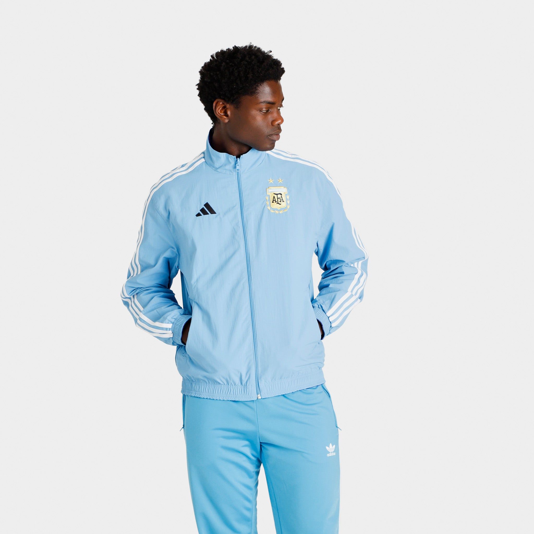 adidas Argentina Reversible Anthem Jacket / Light Blue sold by JD Sports