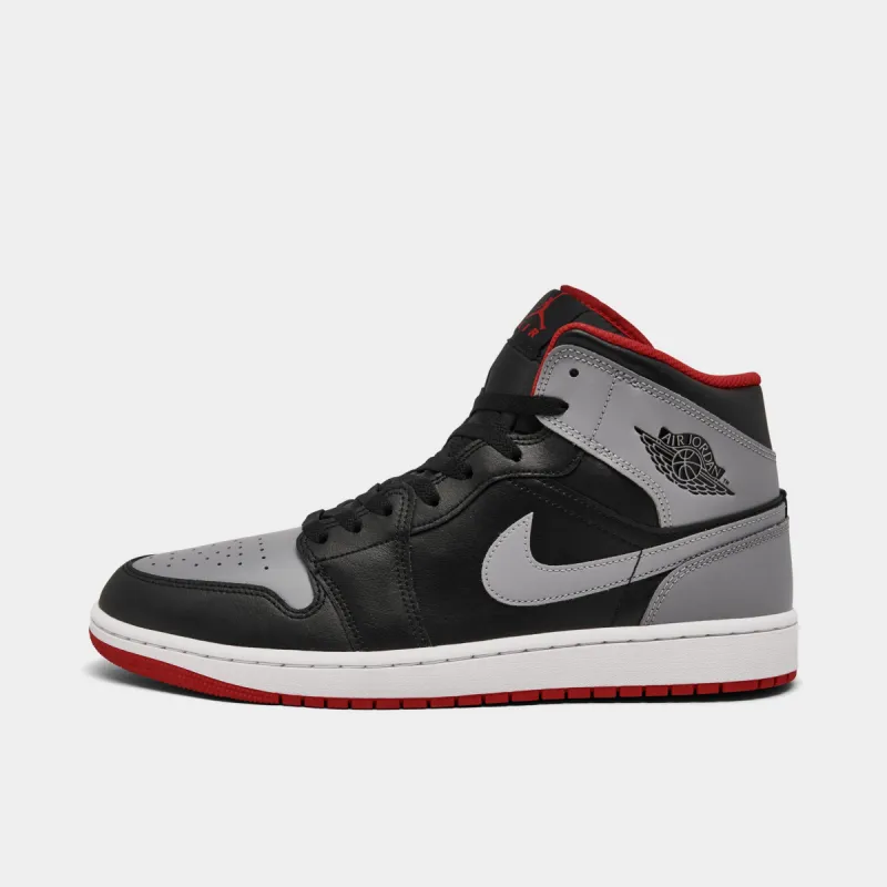 Jordan 1 Mid Black / Cement Grey - Fire Red sold by JD Sports