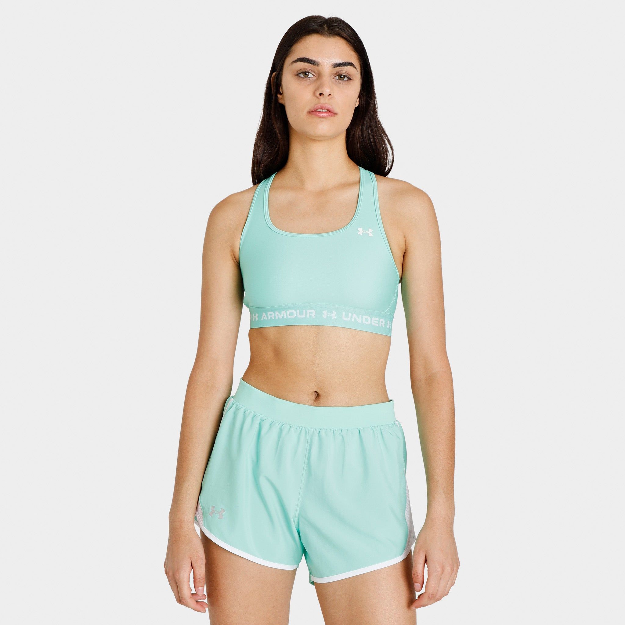 Under Armour Women's HeatGear� Logo Band Sports Bra Green Breeze / White sold by JD Sports