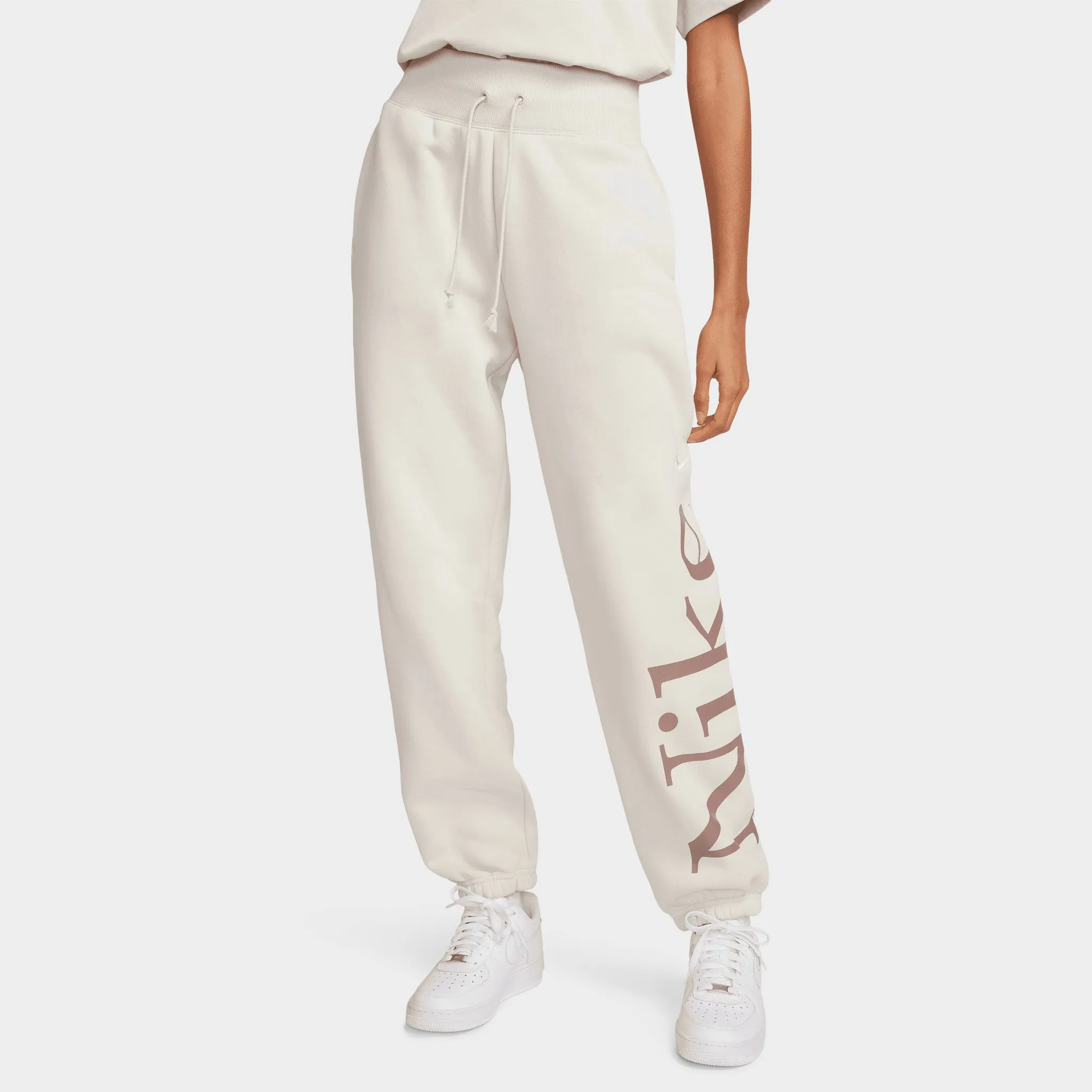 Nike Sportswear Women's Phoenix Fleece Oversized Logo Sweatpants Light Orewood Brown / Smokey Mauve - Sail sold by JD Sports