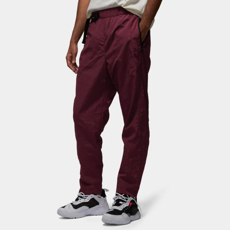 Jordan 23 Engineered Woven Pants / Cherrywood Red sold by JD Sports