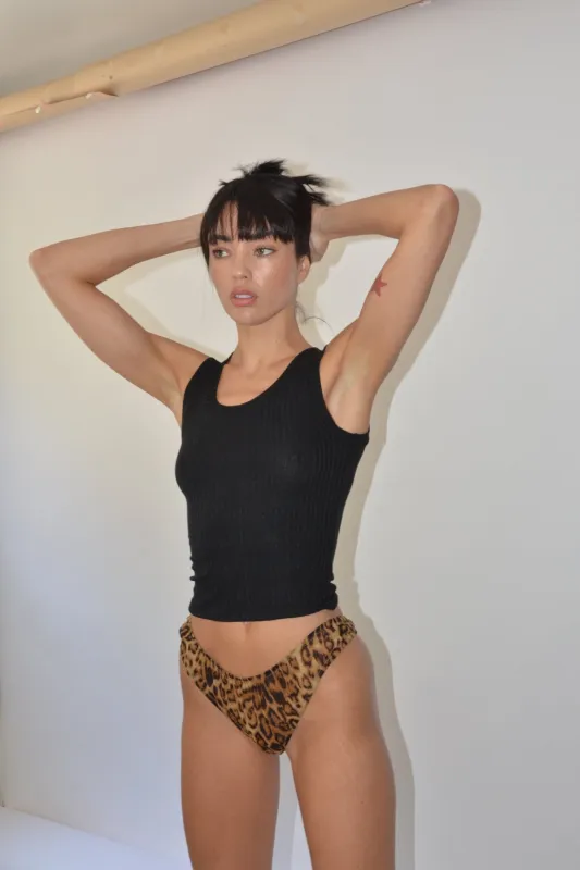 Financier Tank sold by Kat Zarra