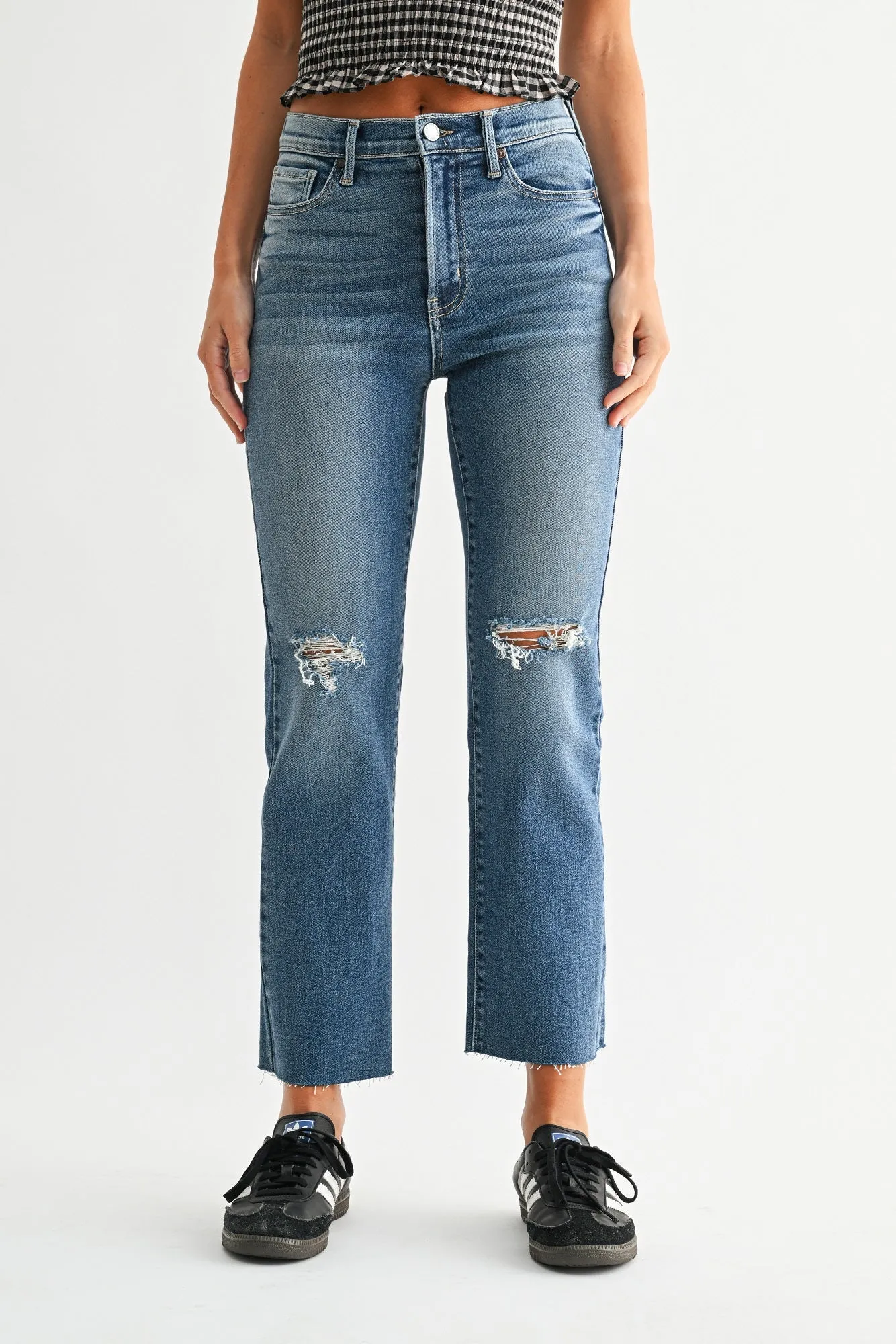 The Distressed Slim Jean sold by Just Black Denim
