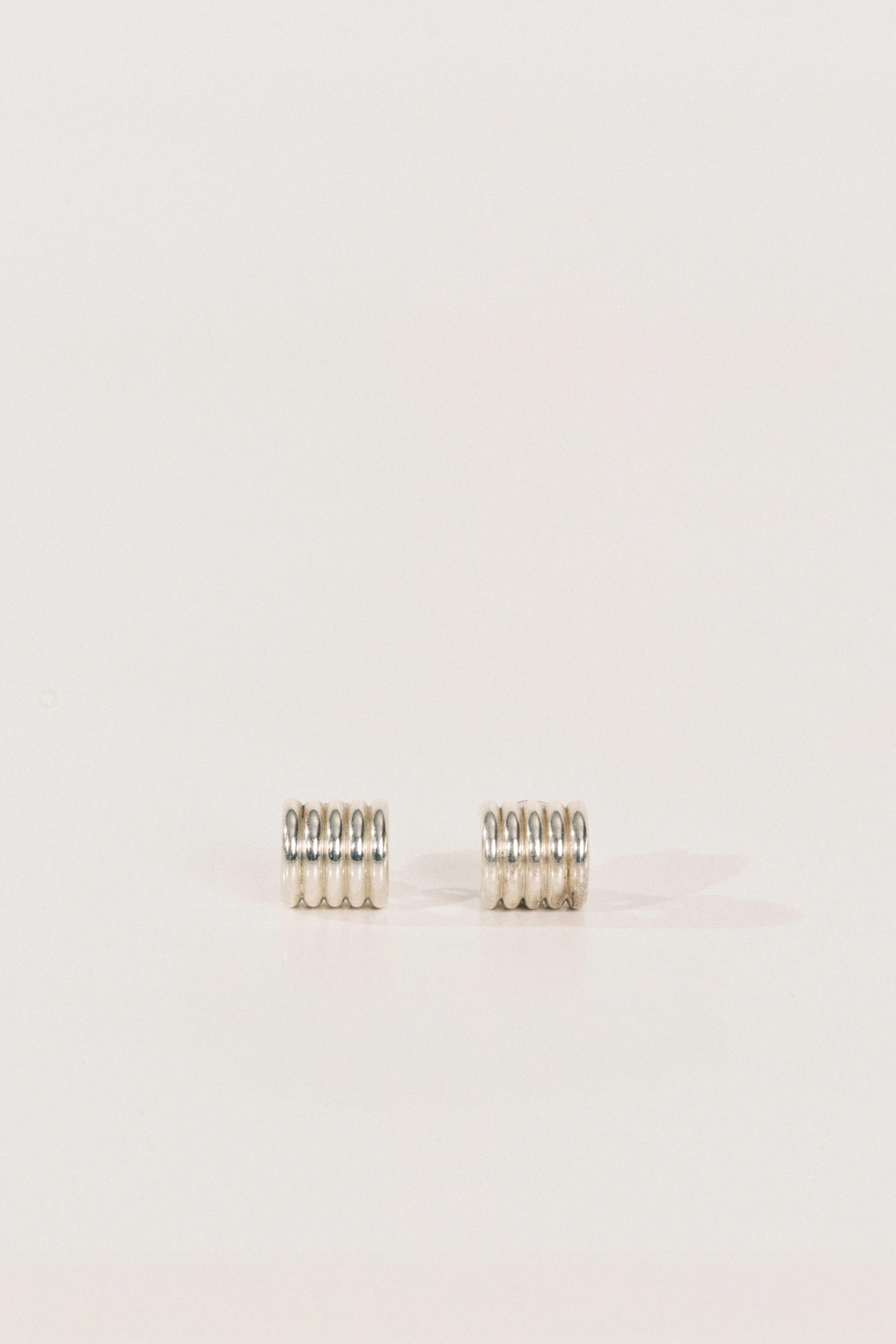 Hollyhock Silver Earrings Small sold by Dehanche