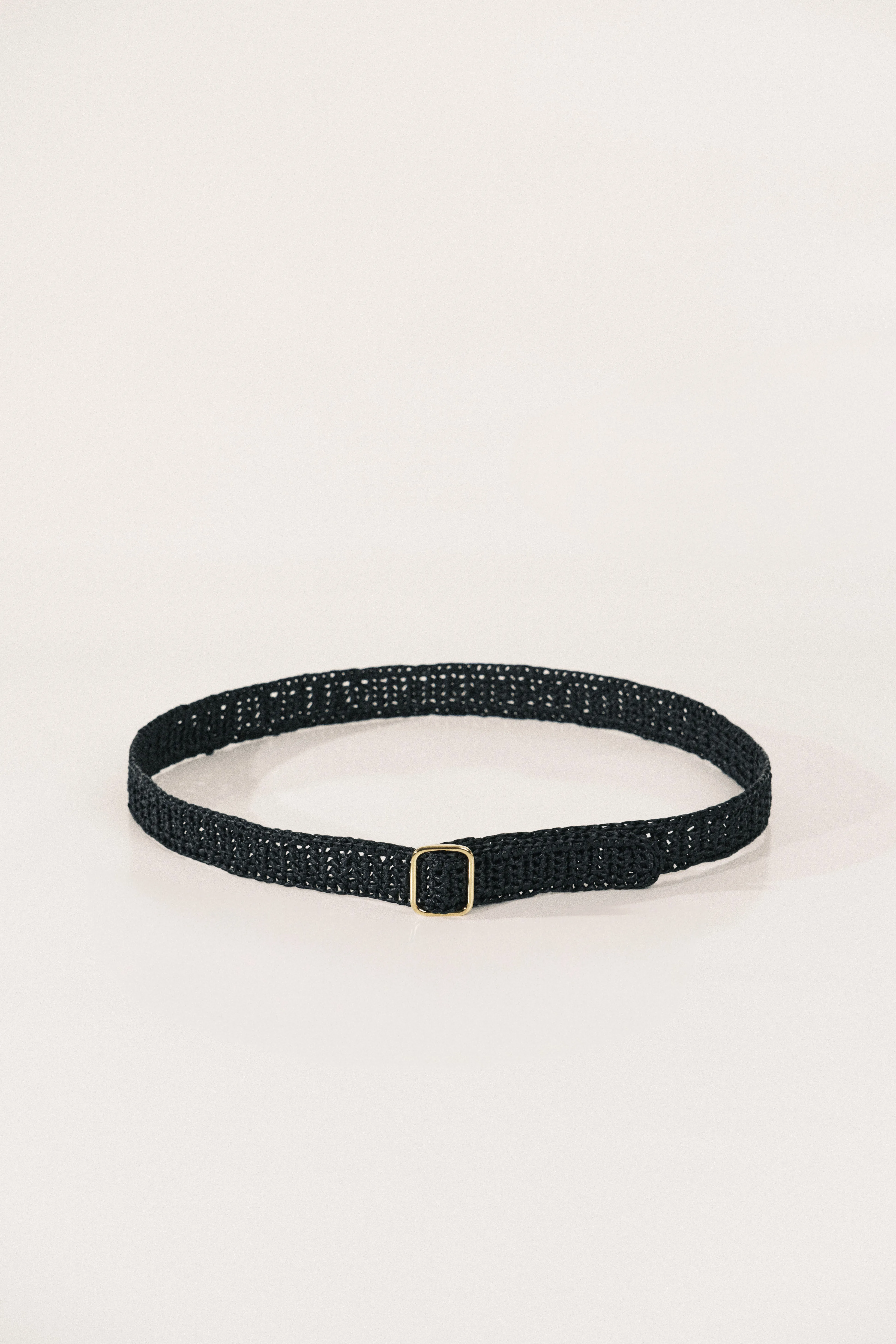 Mako Black Raffia Gold sold by Dehanche