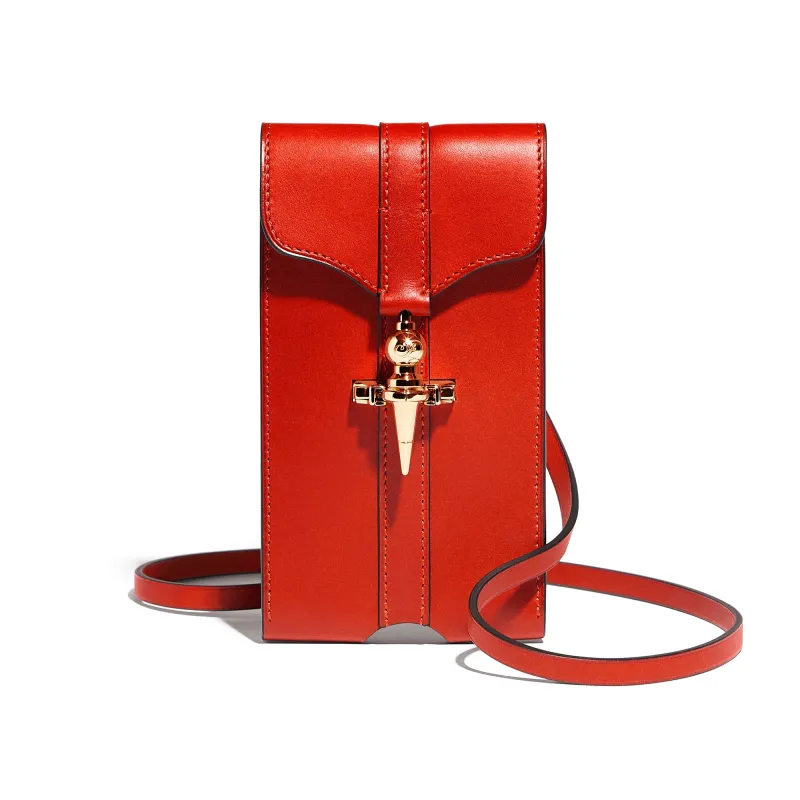 Diane Mini Clutch in Coquelicot Héritage leather  sold by Joseph Duclos