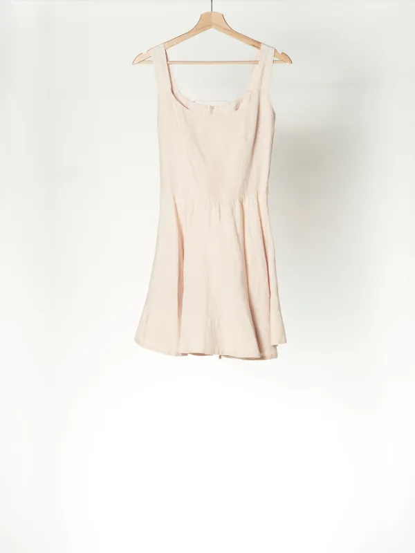 Seashell White Sleeveless Mini Pinafore Dress sold by Son de Flor