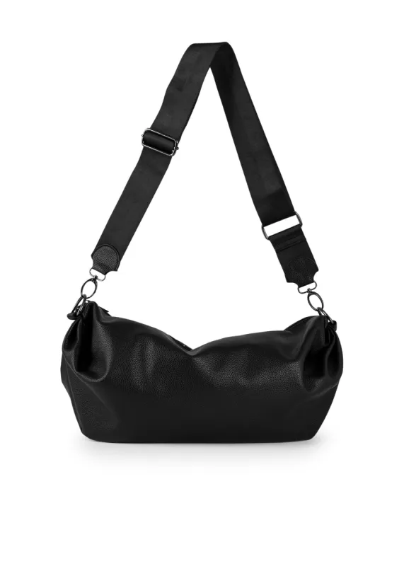 The Ollie Solo Pebbled Sling Bag sold by HAUTE SHORE