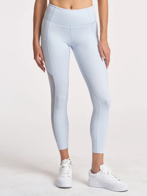 Sheen Mesh 7/8 Pocket Legging sold by Thrive Societe
