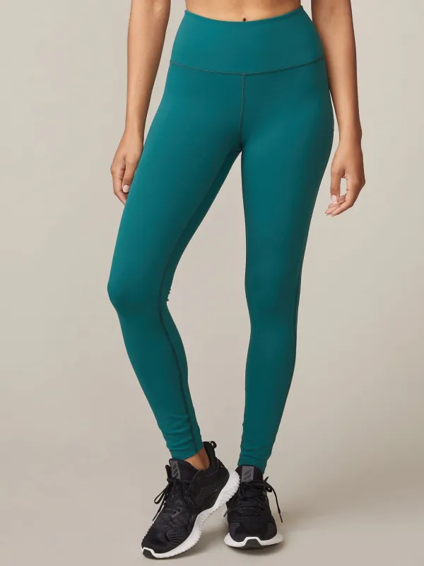Endure Zip Pocket Legging sold by Thrive Societe