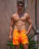 Splatter Swim Shorts Orange - 5" sold by Tucann