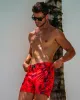 Splatter Swim Shorts Red - 5" sold by Tucann