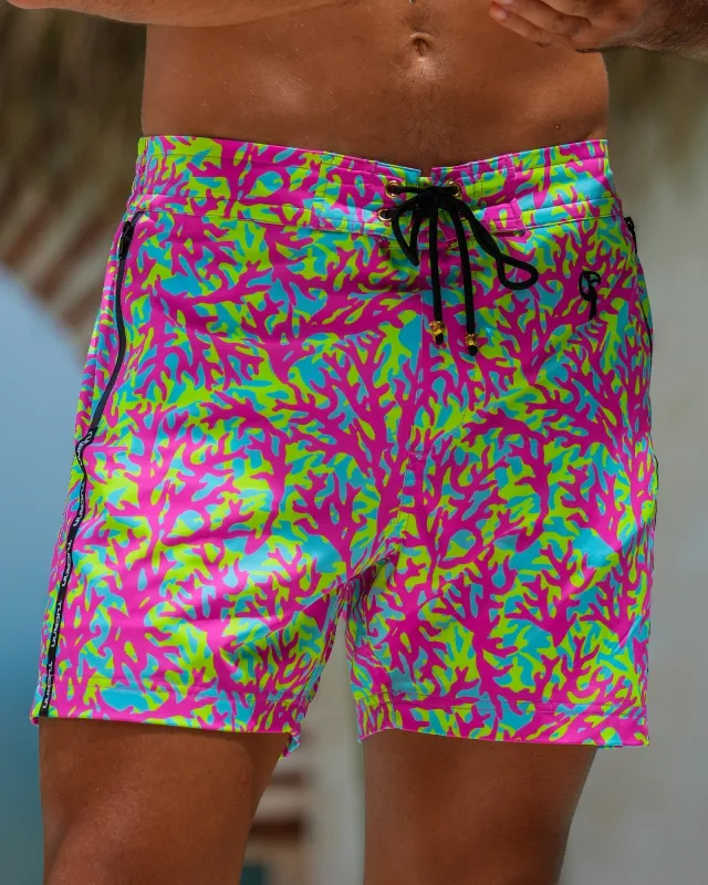 Candy Coral Swim Trunks 5" sold by Tucann