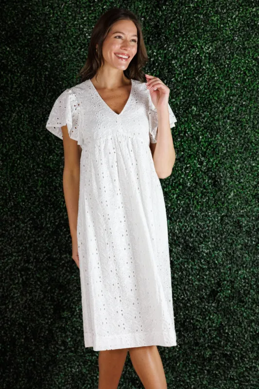The Avis Dress in White Eyelet sold by Duffield Lane