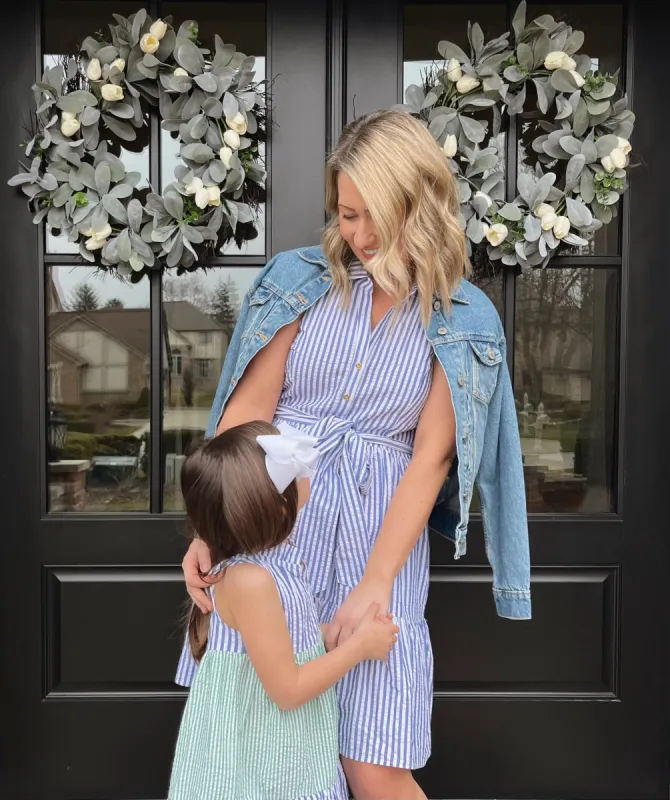 The Ann Dress in Awning Blue Seersucker sold by Duffield Lane