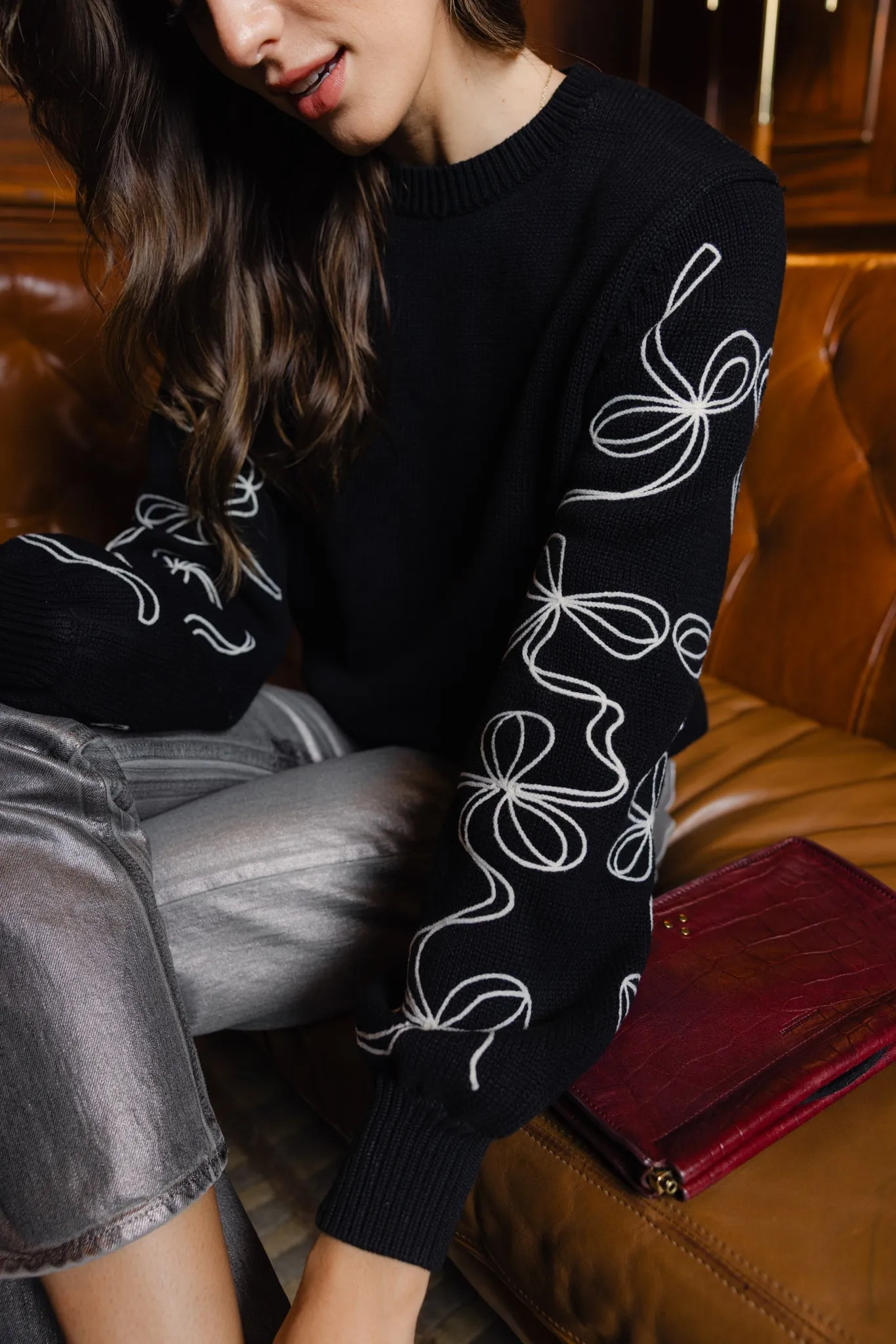 Bow Sleeve Crew Neck Sweater in Black sold by Duffield Lane