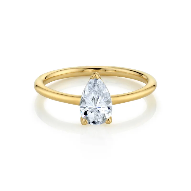 The Lola Pear Solitaire Engagement Ring sold by Marrow Fine
