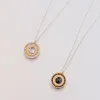 Black Diamond La Femme Amulet sold by Marrow Fine