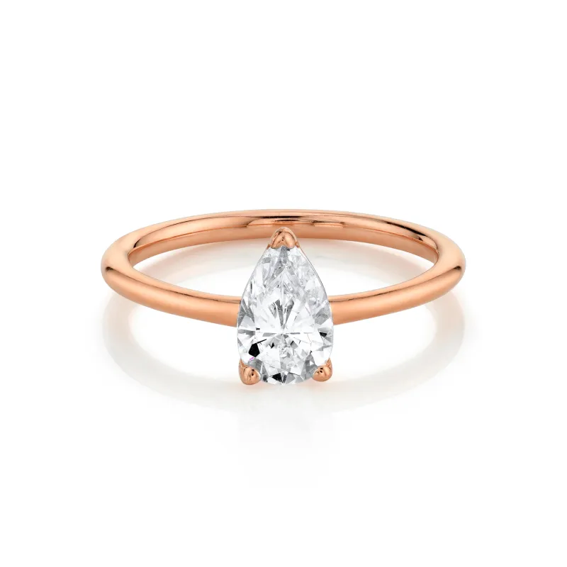 The Lola Pear Solitaire Engagement Ring sold by Marrow Fine